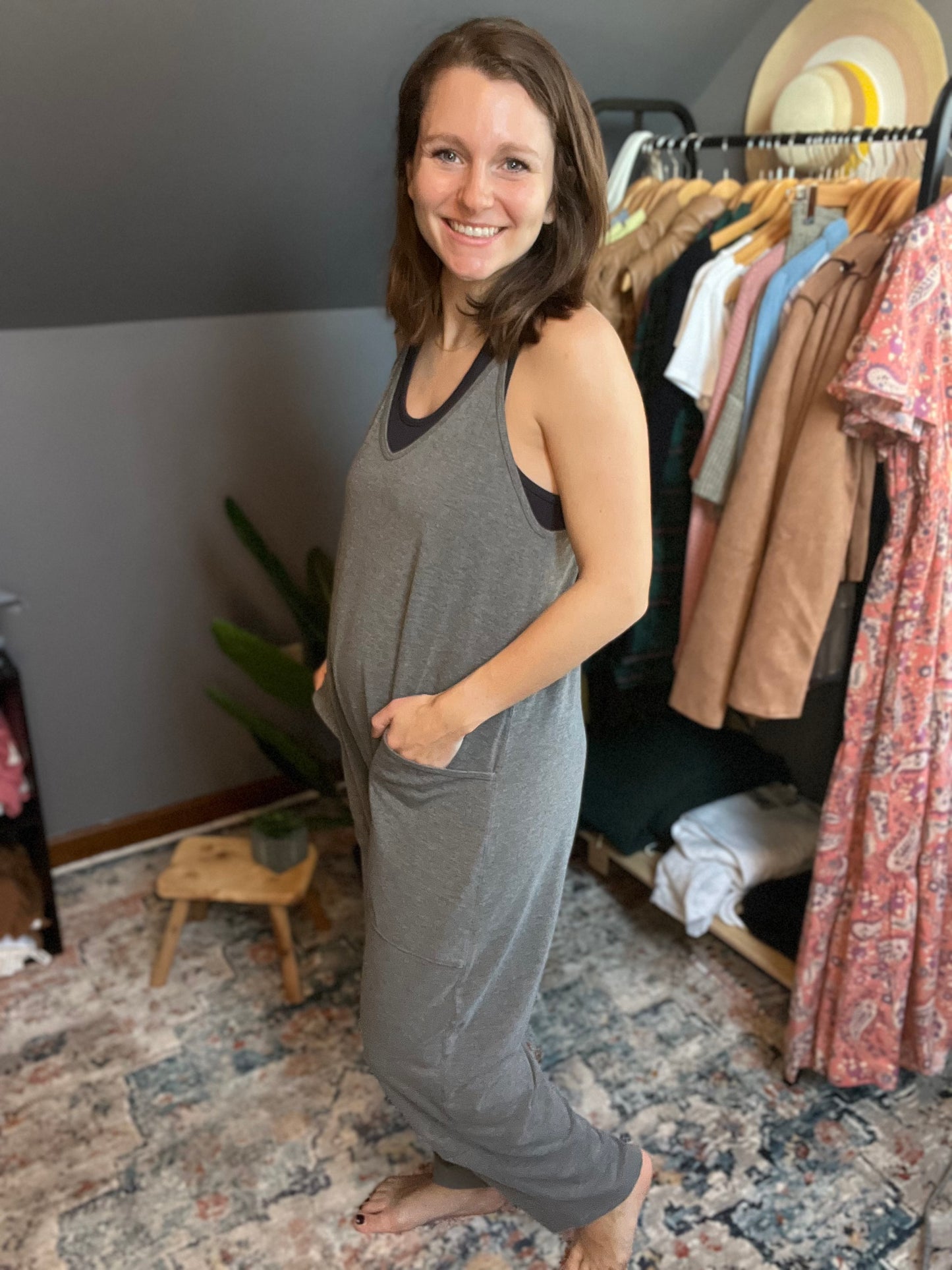 gray lounge jumpsuit paired with black brami 