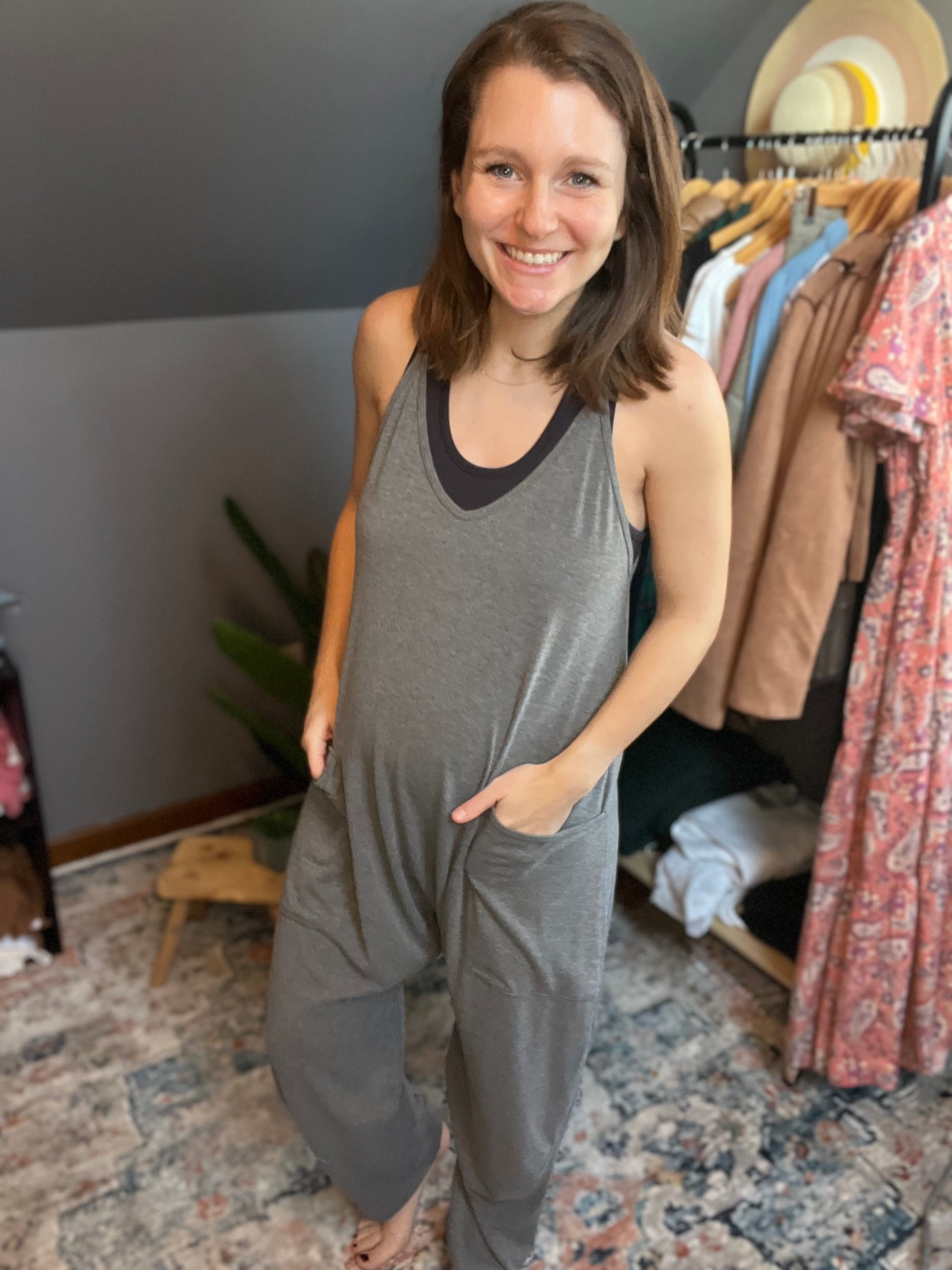 gray lounge jumpsuit paired with black brami 